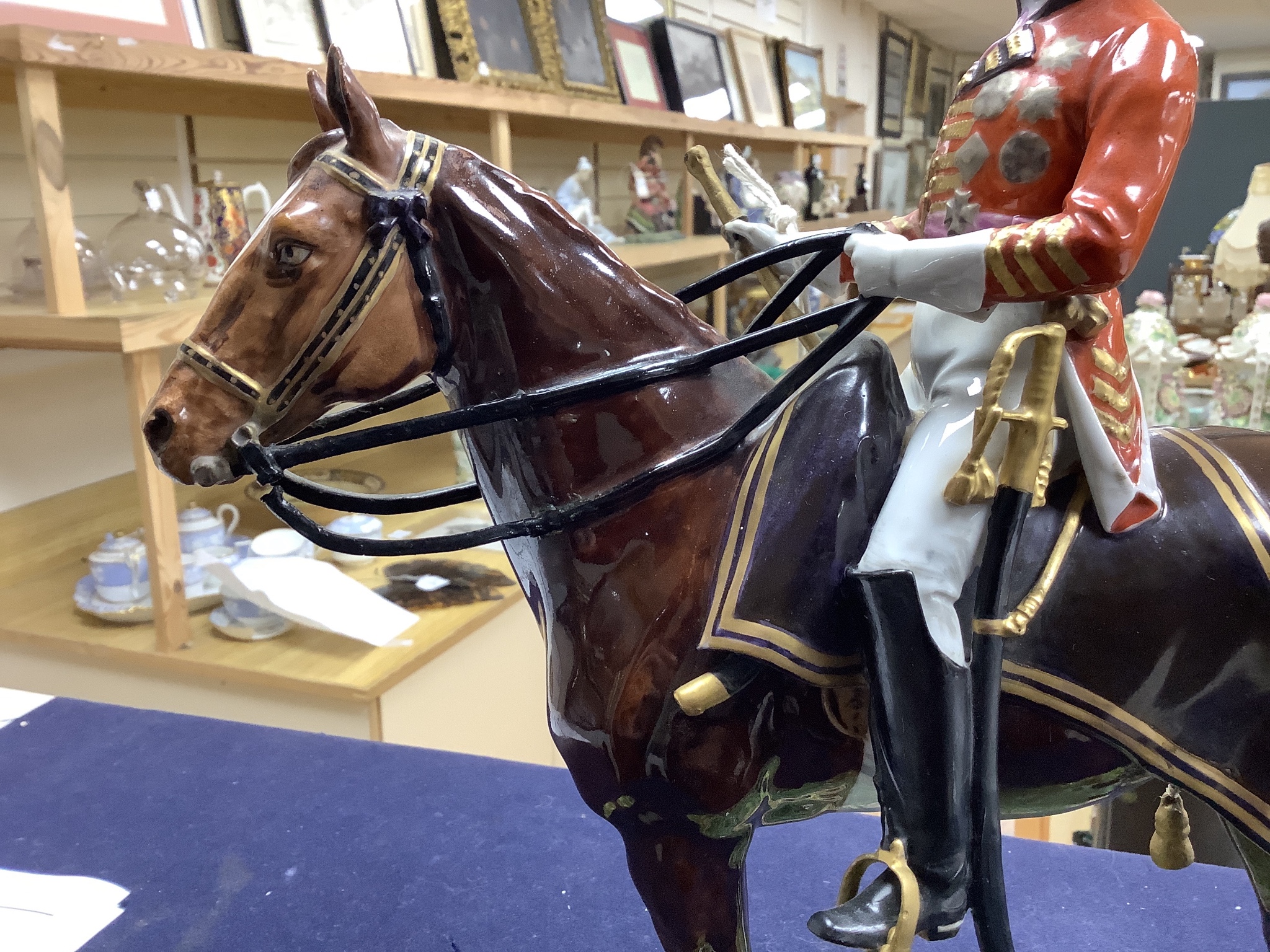 A large Dresden porcelain Waterloo Centenary equestrian group of the Duke of Wellington, retailers mark of Thomas Goode & Co and a similar equestrian group, 'Timbalier des Grenadiers a Cheval', pseudo mark, and an anothe